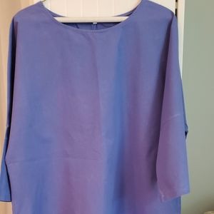 Long bell sleeve top.